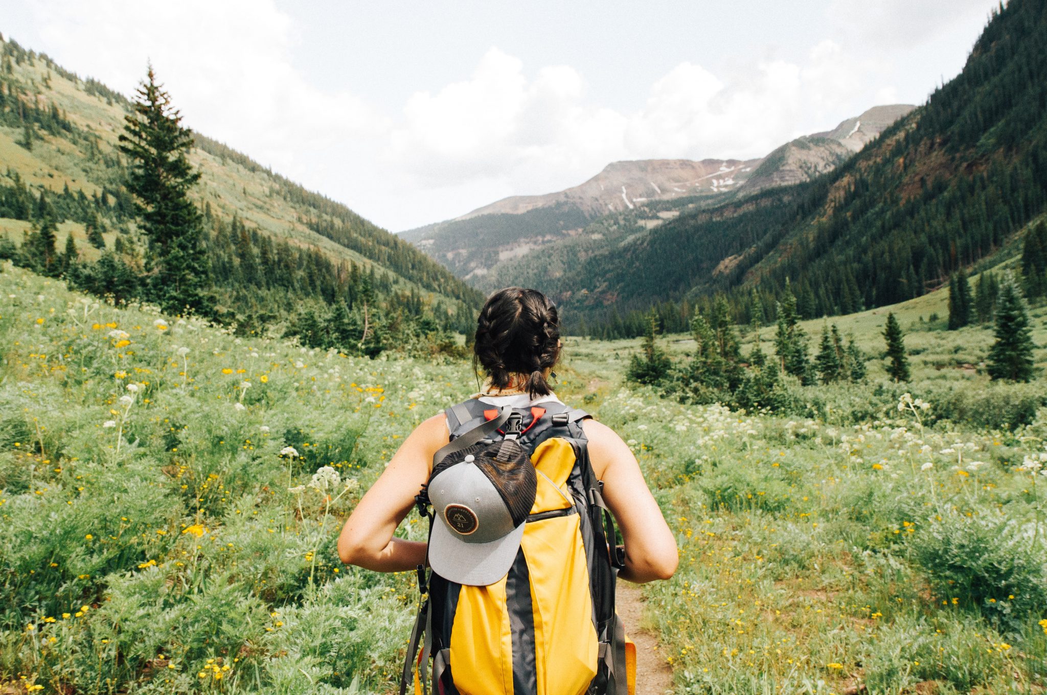 Woman with a backpack walking outdoors